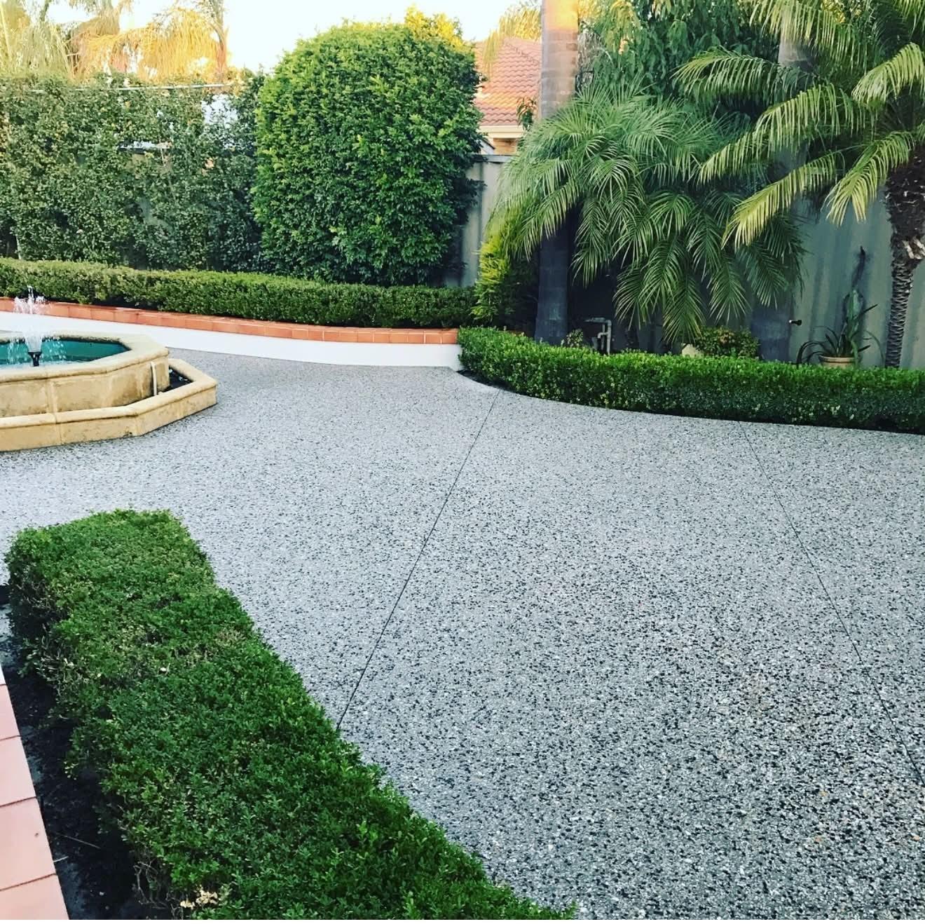 Exposed aggregate courtyard with fountain